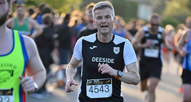 Senior man running for Deeside A.A.C