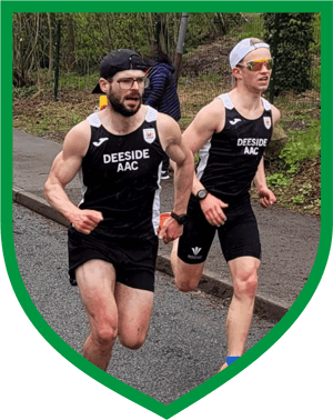 Two Deeside A.A.C male athletes during run