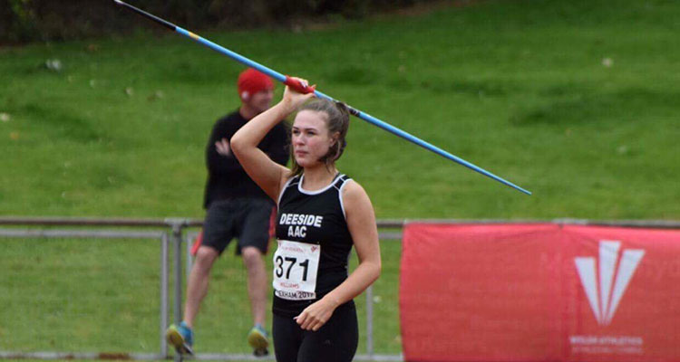 Teenage girl with javelin